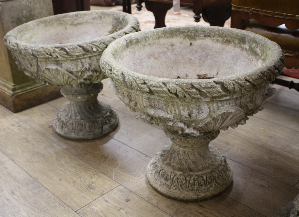 A pair of reconstituted stone garden urns, H.46cm Diam.53cm